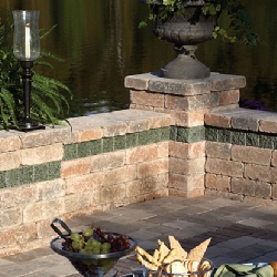 Custom patio rock wall with contrasting trim