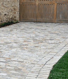 Decorative Brick Driveway and rock wall