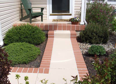 Sidewalk repair with brick edging